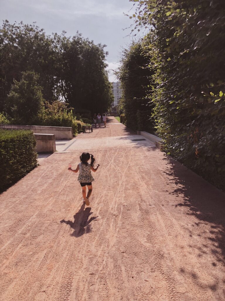 Is Paris stroller-friendly? Exploring the city with a toddler Running through Parc Andre Citroen in Paris